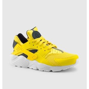Yellow Nike huaraches